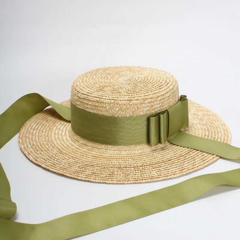 Moterys vasarą šiaudų skrybėlę butas geriausių Europos ir Amerikos mados žalia peteliškę skėtį nuo saulės atostogų išvyka Pajūrio turizmo nuotrauka